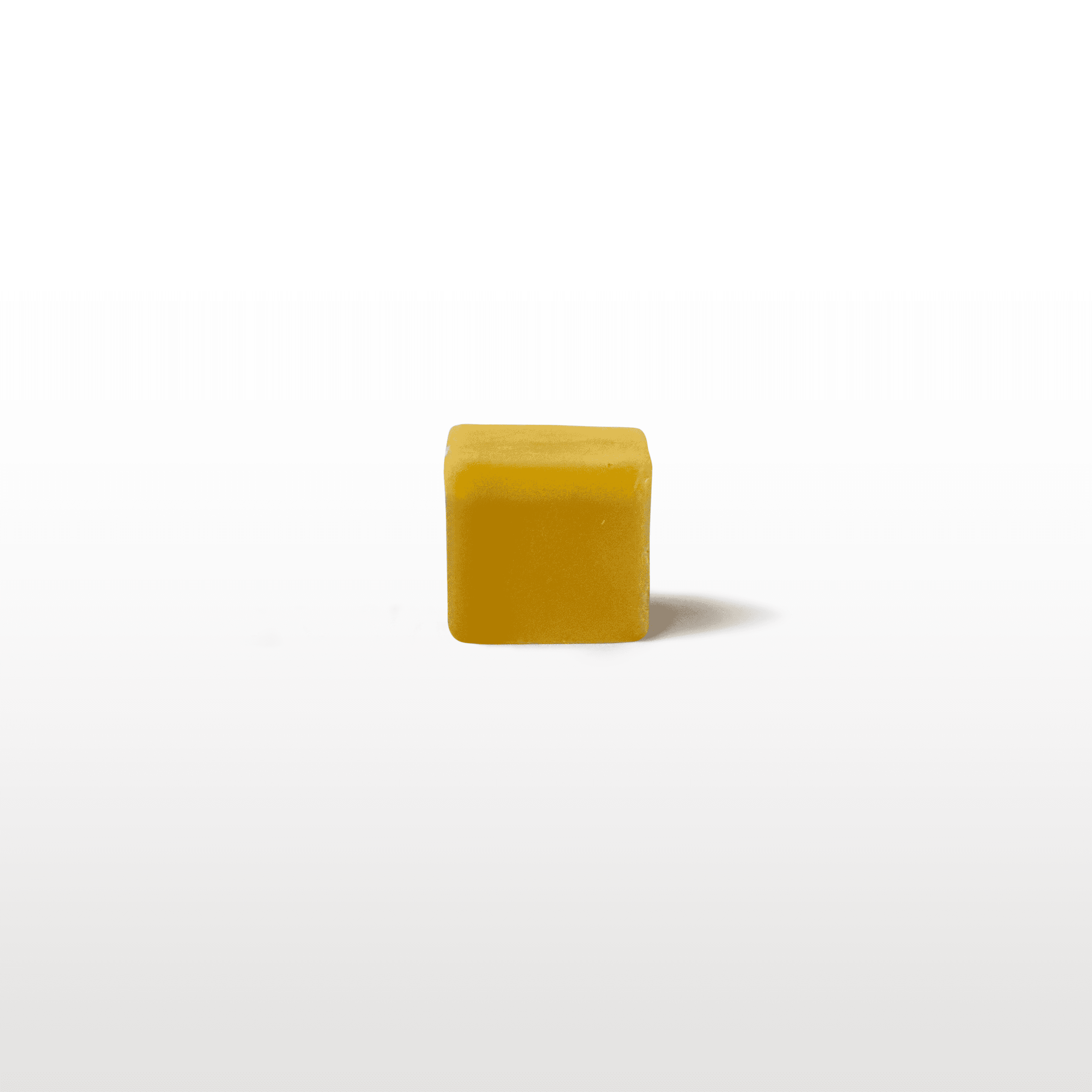 a small cube of wax